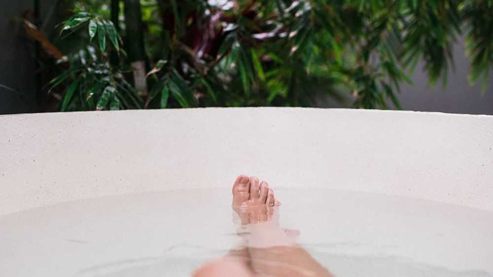 Feet at end of outdoor bath